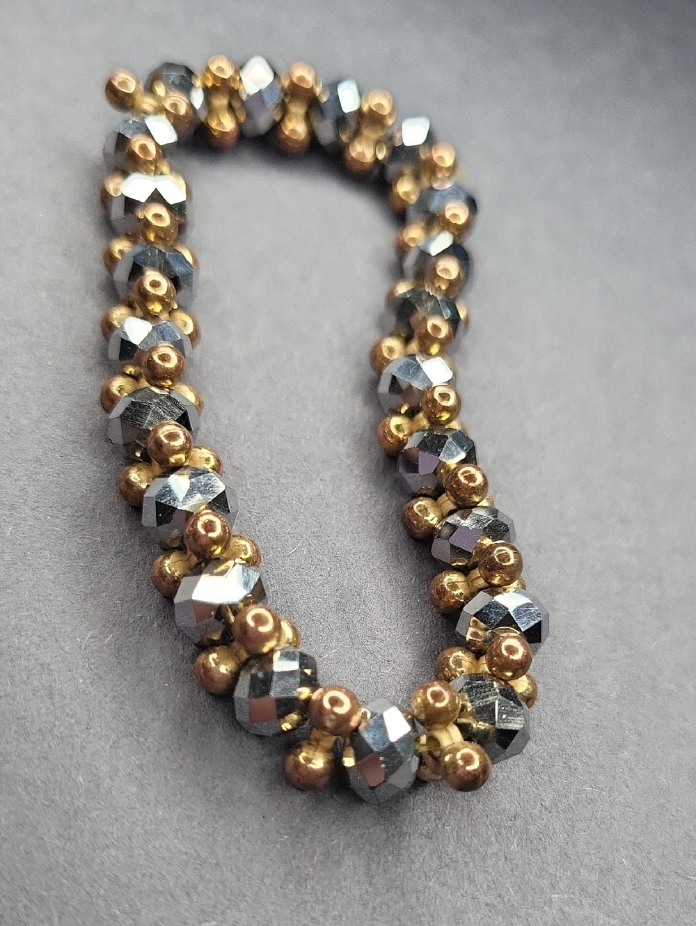 Gold and Hematite Faceted Bead Stretch Bracelet ⁹